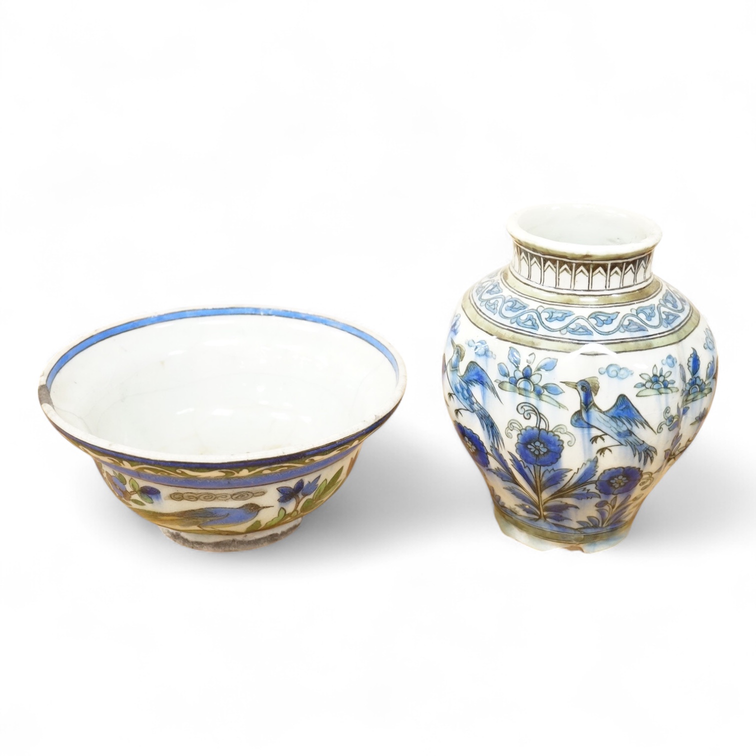 A Persian bird painted fritware lobed vase, 19.5cm high and a similar bowl, Qajar dynasty (2)